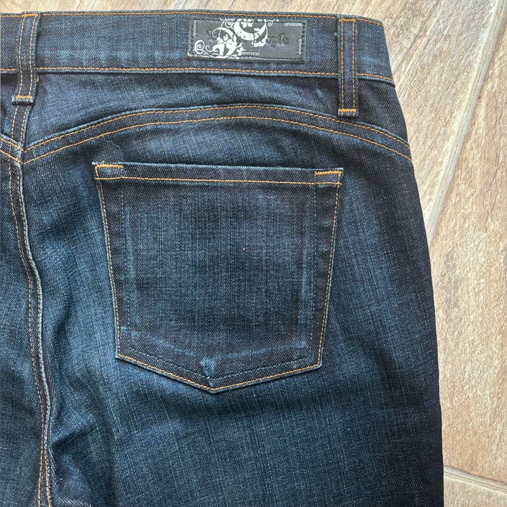 We The People Free People denim blue jeans dark wash mid rise